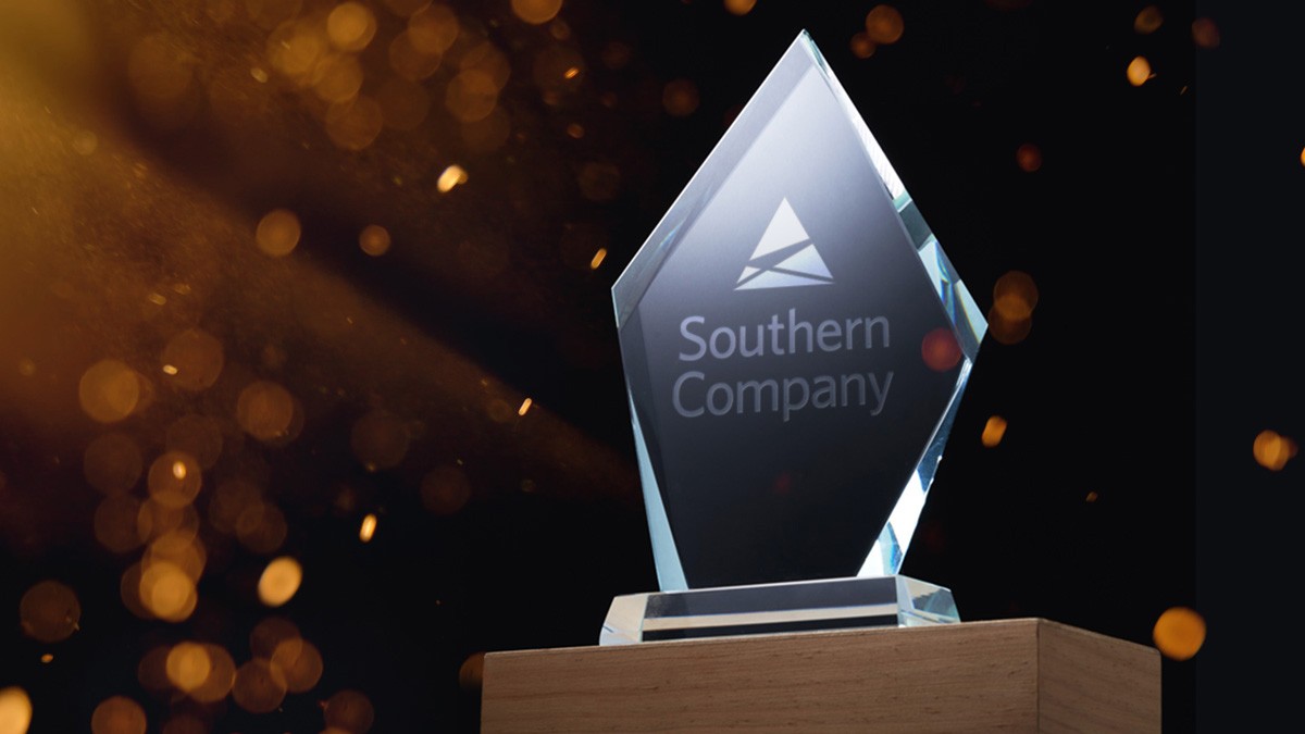 Crystal trophy with Southern Company etched on it