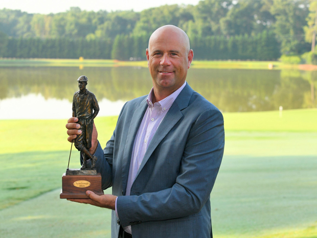 Stewart Cink poses with the Payne Stewart Award.  Photo credit - Stan Badz / PGA TOUR