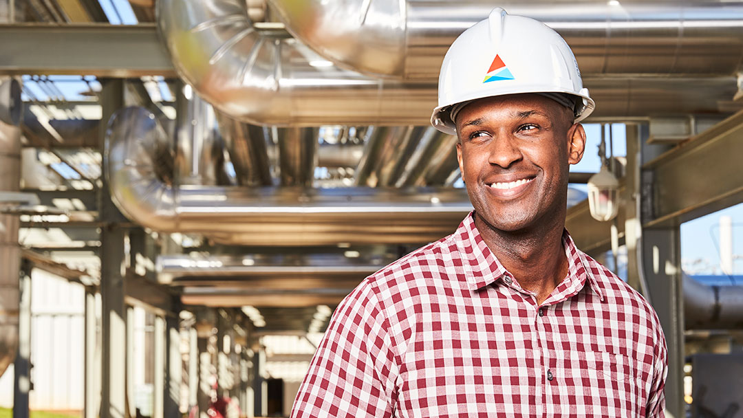 Gas worker smiling FORTUNE magazine world's most admired companies award