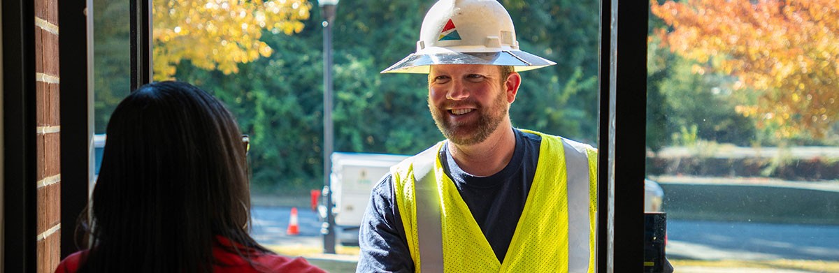 Family smiling and enjoying baby