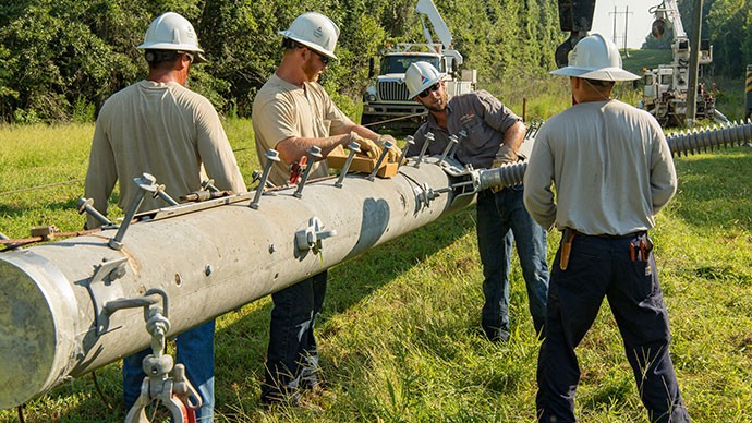 Georgia Power lineman performing replairs on a power pole
