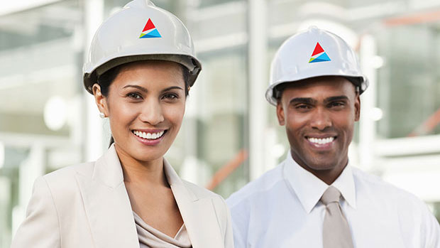 Man and woman wearing hardhats with Southern Company logo