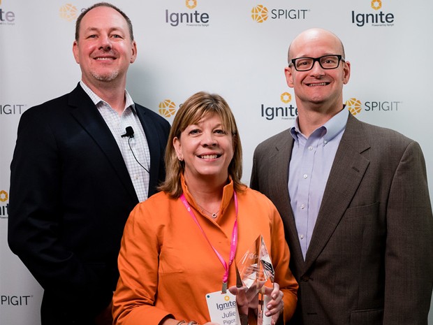 Julie Pigott, Paul Brooks, and Jason Pastras of the EIC, accept the “Most Innovative Approach” award at Ignite 2017