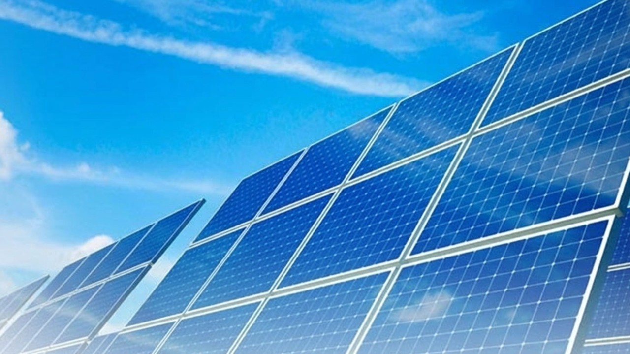 Solar panels before blue sky